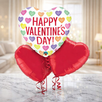 Valentine balloon set with a white Happy Valentine's Day heart foil balloon and two red heart foil balloons
