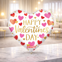 White heart foil balloon printed Happy Valentine's Day with red and pink hearts