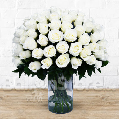 Purity  White Roses on a Glass Vase