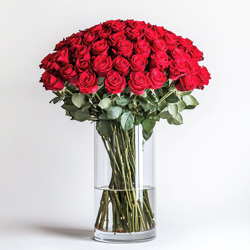 Classy Love Red Roses Fresh Flower Arrangement on a Glass Vase