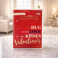 Valentine greeting card in red and gold printed Hug Love Kisses
