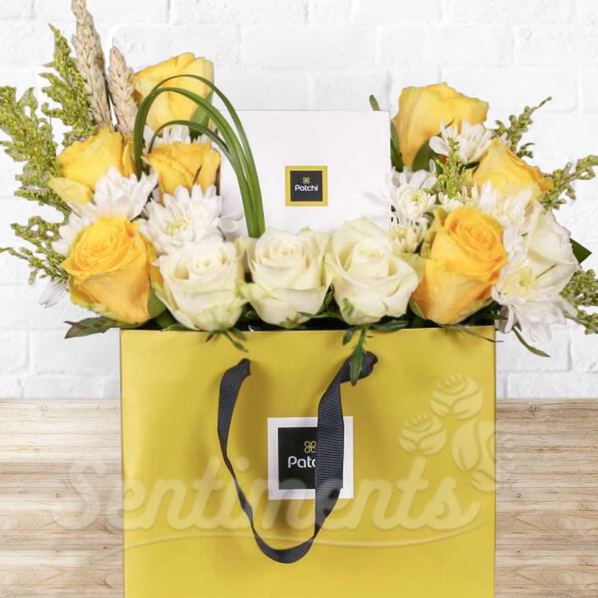 Bag of Sweetness and Roses Flower Arrangement with Patchi Chocolate