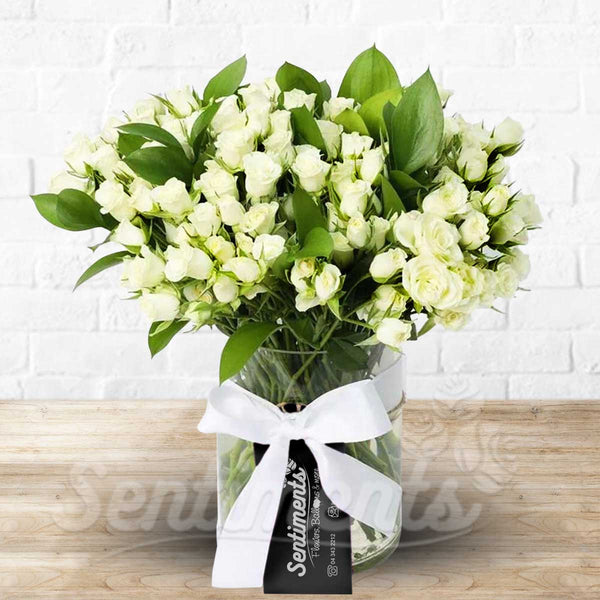 Purity  MiniRoses on a Glass Vase