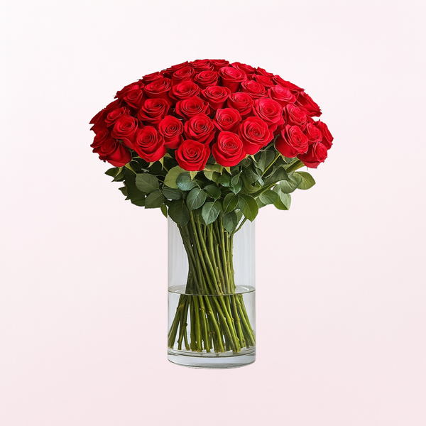 Loveable Red Roses Fresh Flower Arrangement on a Glass Vase