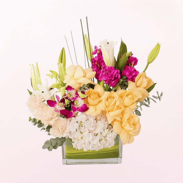 Vivid Colors Mixed Flowers on a Glass Vase