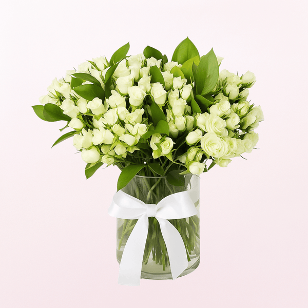 Purity  MiniRoses on a Glass Vase