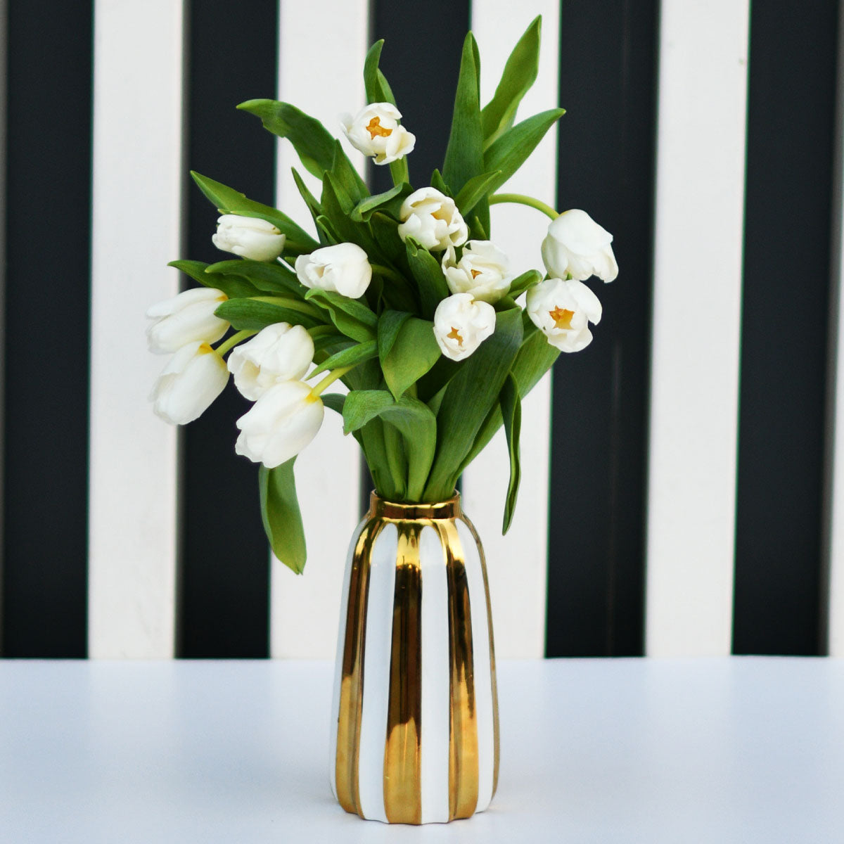 Clearly White  Tulip Arrangement on a Glass Vase